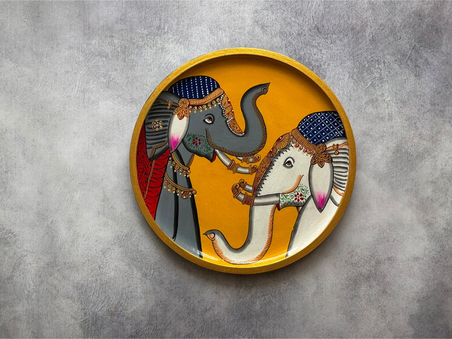 Tusks & Tales – A Royal Romance | Handcrafted Decorative Wall Plate with Entwined Elephants (M)