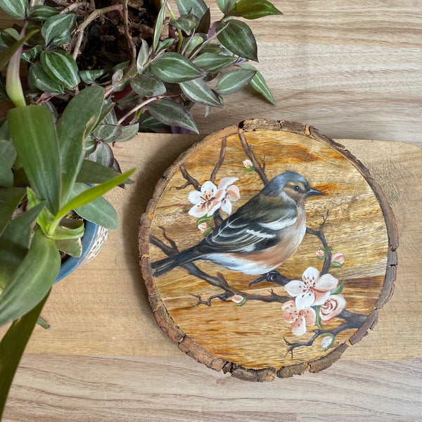 Meadow Muse – Handpainted Finch on Wooden Log with Blossoms