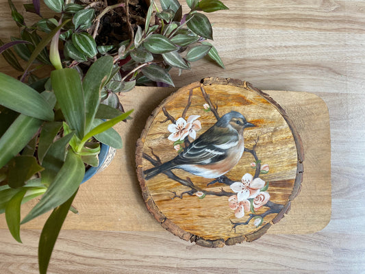 Meadow Muse – Handpainted Finch on Wooden Log with Blossoms
